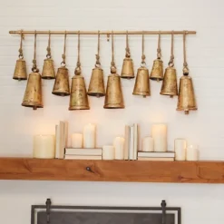 Kirkland's Home Decorative Accents-Aged Triangle Bells Wall Plaque