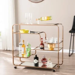 Kirkland's Home Kitchen Islands & Bar Carts-Gold Curved Metal Mirrored Bar Cart