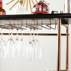 Kirkland's Home Kitchen Islands & Bar Carts-Oblong Gold Metal Frame Bar Cart